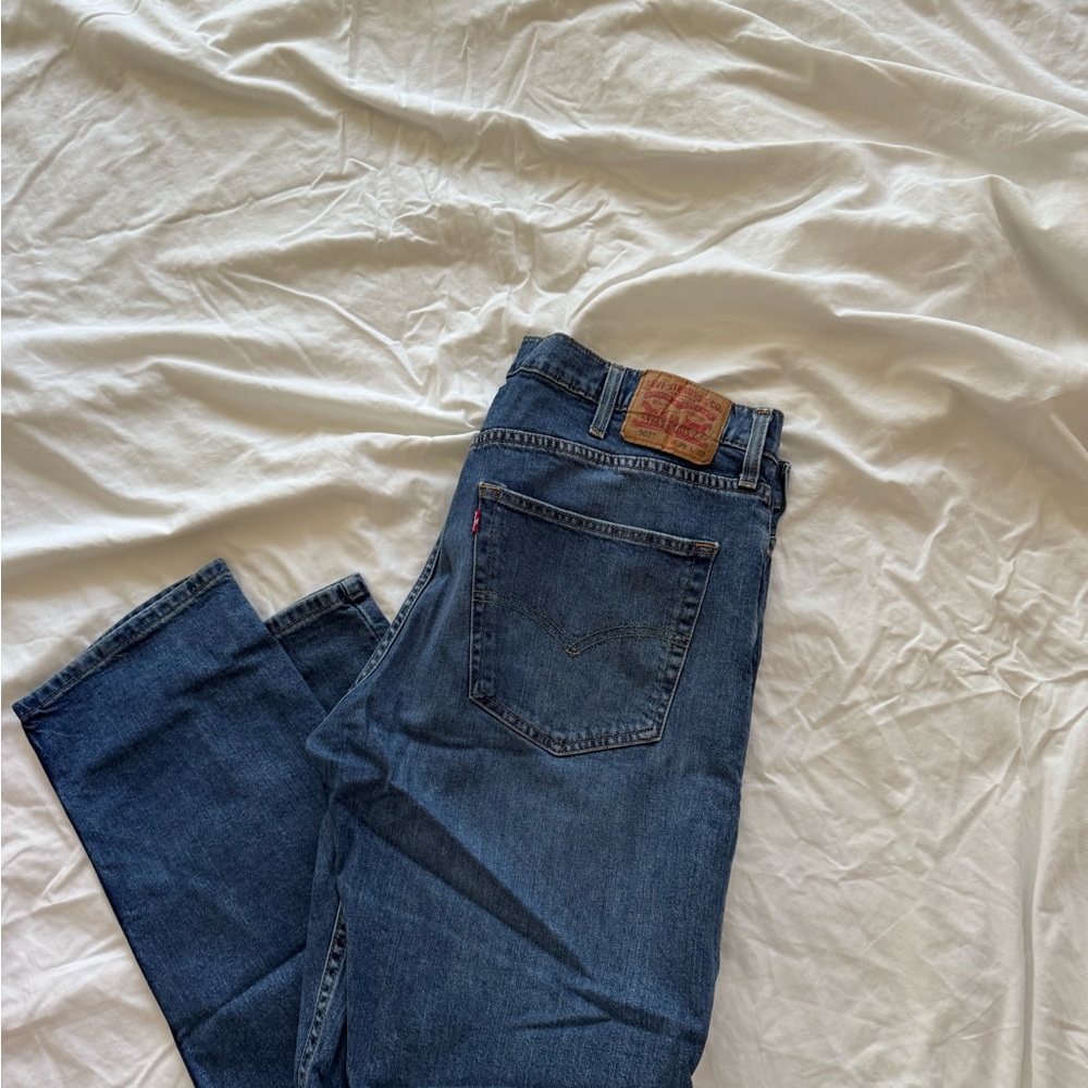 Levi's Dark Blue Straight Jeans with Tan Leather Patch